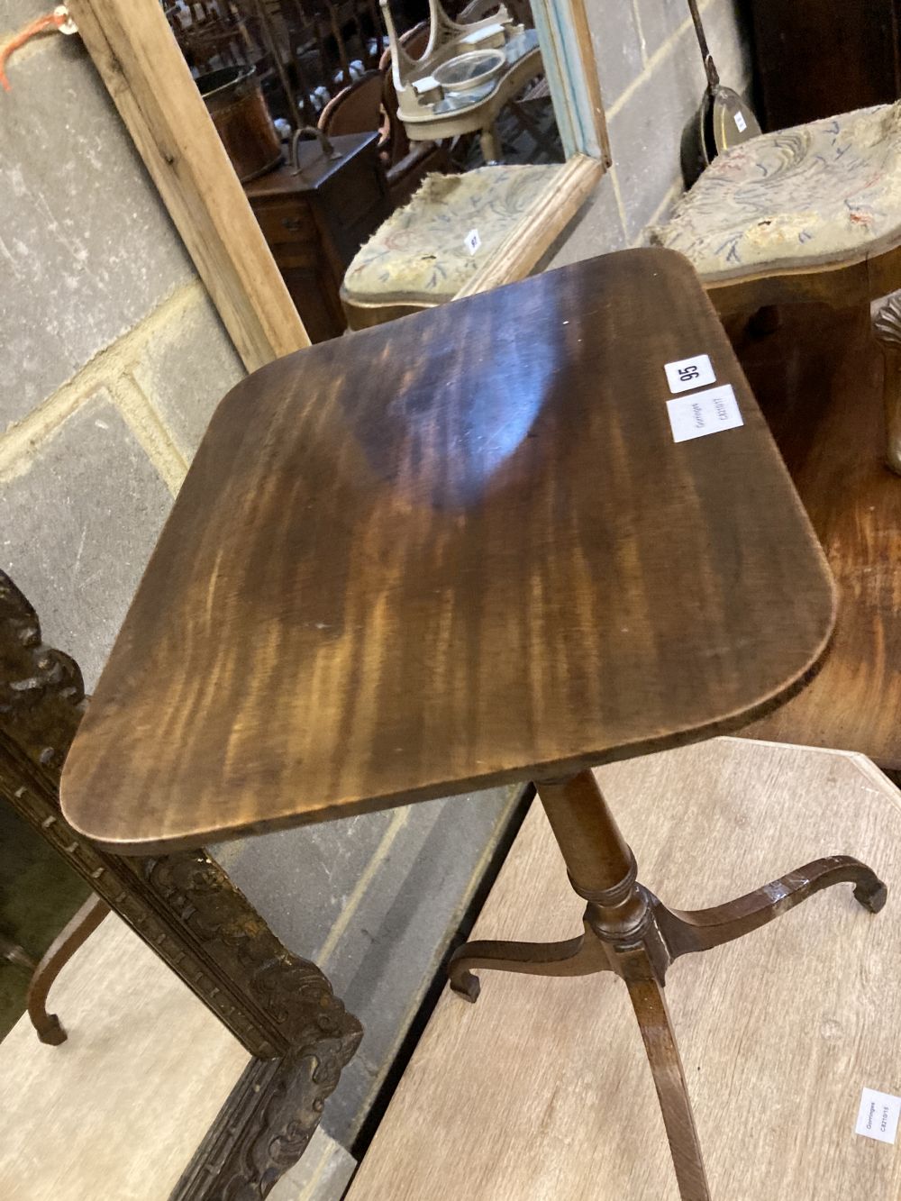 A Regency mahogany tripod wine table, width 44cm depth 34cm height 70cm